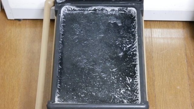氷が入ったクーラーボックスの画像。